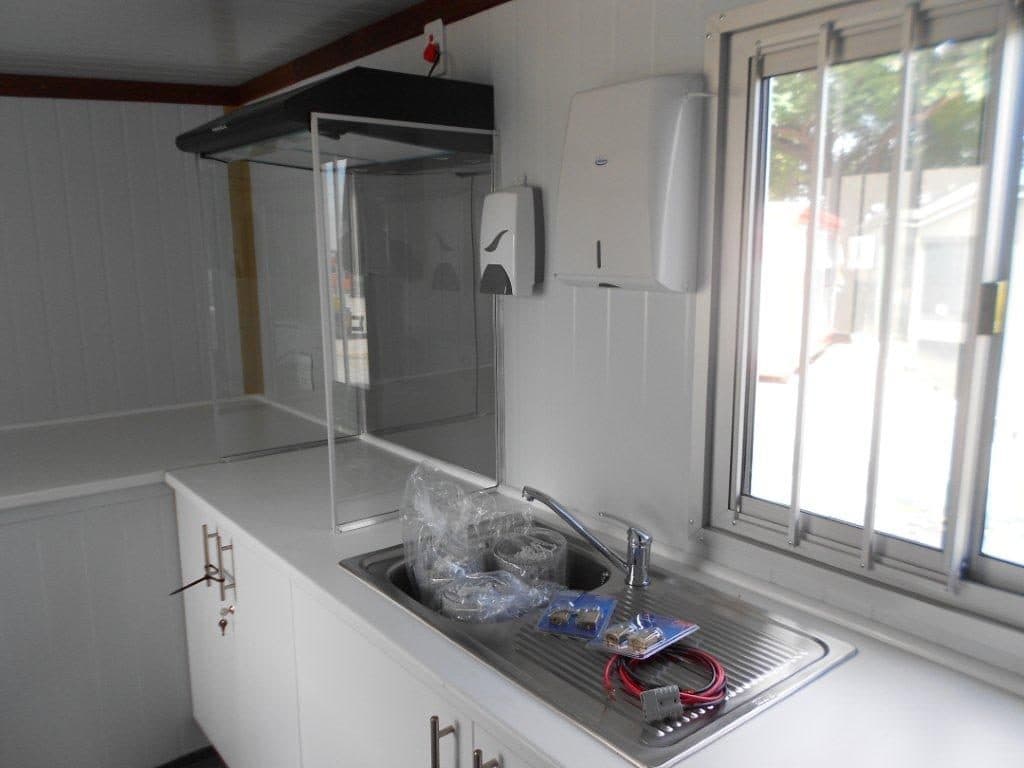 Interior of the NEMA mobile laboratory: fume extraction, sink and bench space