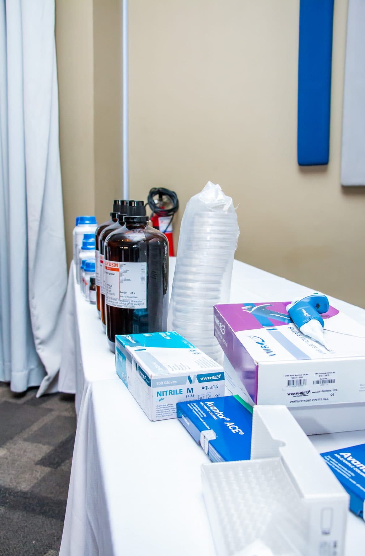 Solvents alongside gloves, tips and laboratory consumables